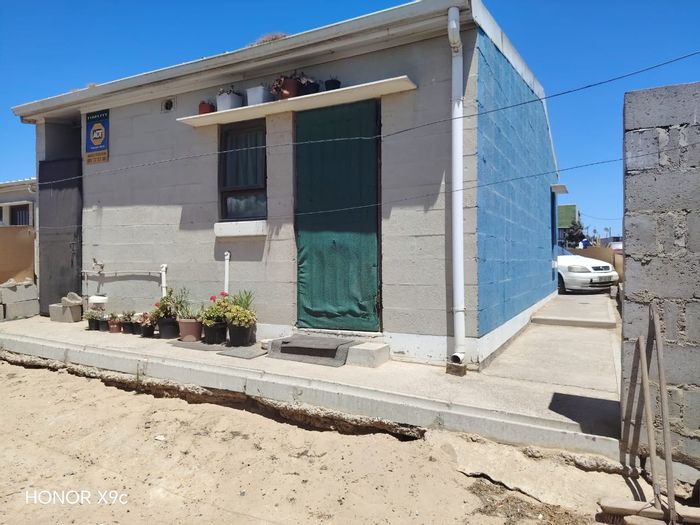 For Sale: 2-bedroom house in Greenville Garden City with spacious yard.