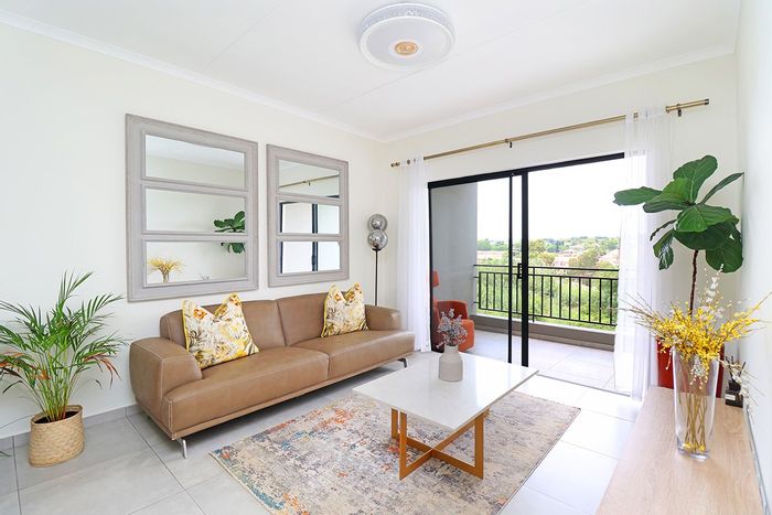 For Sale: Apartment in Fourways with open-plan living, secure lock-up-and-go convenience.