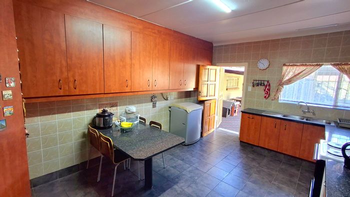 For Sale: Spacious 4-bedroom house with pool, garage, and entertainment area in Sasolburg Ext 5.