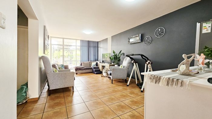 Ground floor apartment in Three Rivers Proper with private garden and garage. For Sale.