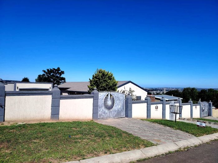 For Sale: 4-Bedroom House in West Bank with double garage, security gates, and braai area.
