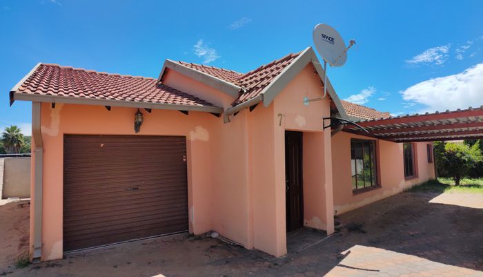 For Sale: House in Modimolle Central with 3 beds, garden, and secure living.