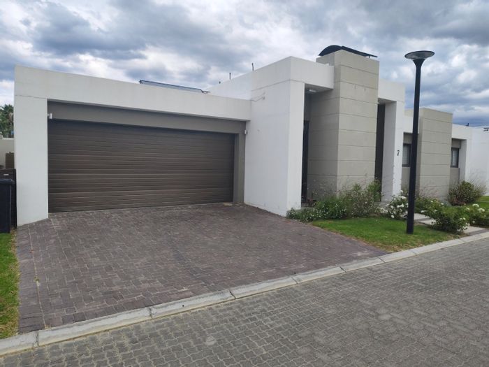 House for Sale in Berg En Dal: Gated estate, three bedrooms, double garage, braai terrace.