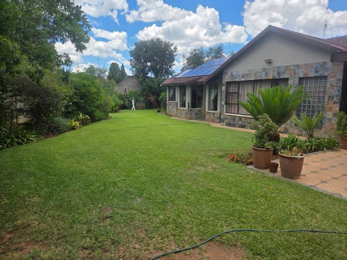 For Sale: House in Wilkoppies with pool, spacious living, and 4 bedrooms.