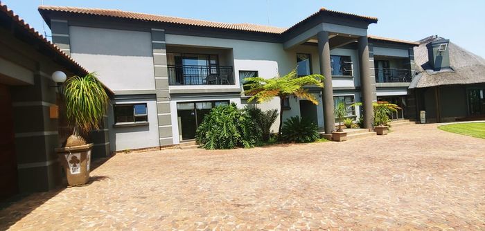 Bredell House For Sale: 20 bedrooms, guesthouse, pools, and investment potential.