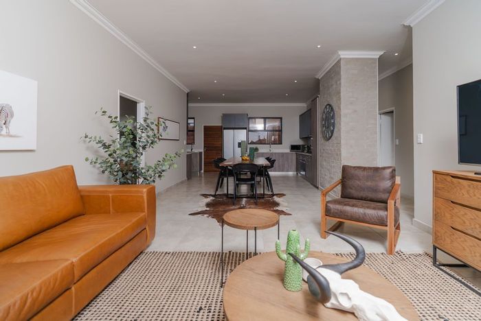 For Sale: Townhouse in Six Fountains with garden, solar backup, and double garage.