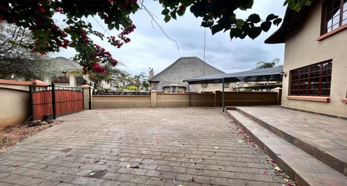 For Sale: Spacious 5-bedroom house in Melodie with braai area and backup water tank.