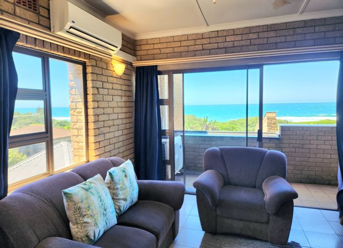 Amanzimtoti Apartment For Sale: Sea views, balcony, communal garden, beach access.