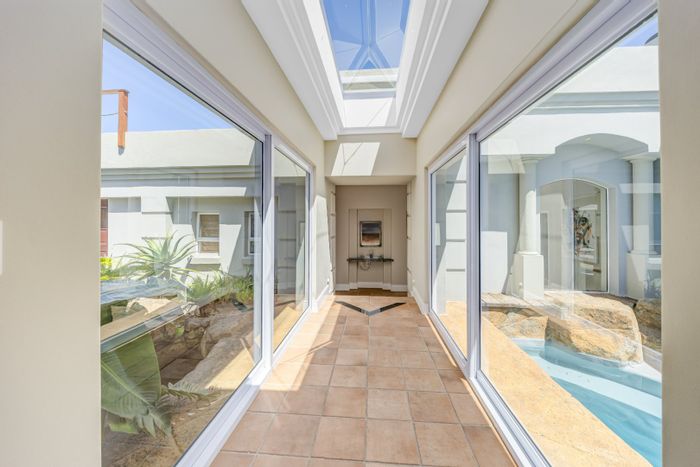 For Sale: House in Pezula Golf Estate with pool, lagoon views, and spacious layout.