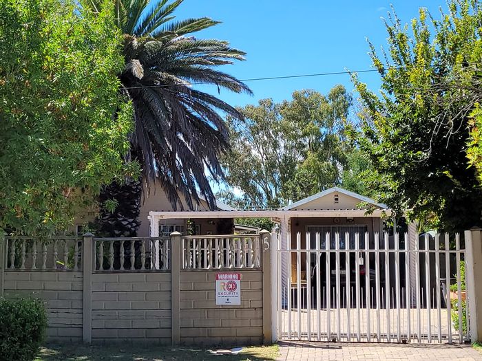 For Sale: House in Odendaalsrus Central with pool, borehole, and granny flat.