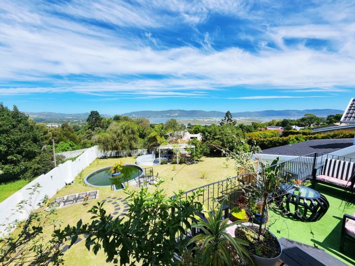 For Sale: Spacious 7-bedroom house in Old Place with lagoon views and solar power.