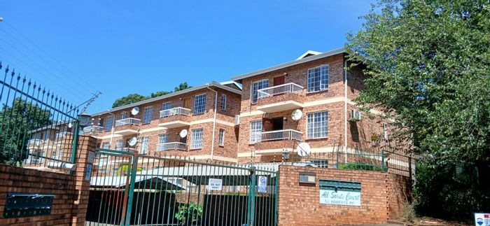 For Sale: 2-bedroom apartment in Clarendon, near malls and schools, secure living.
