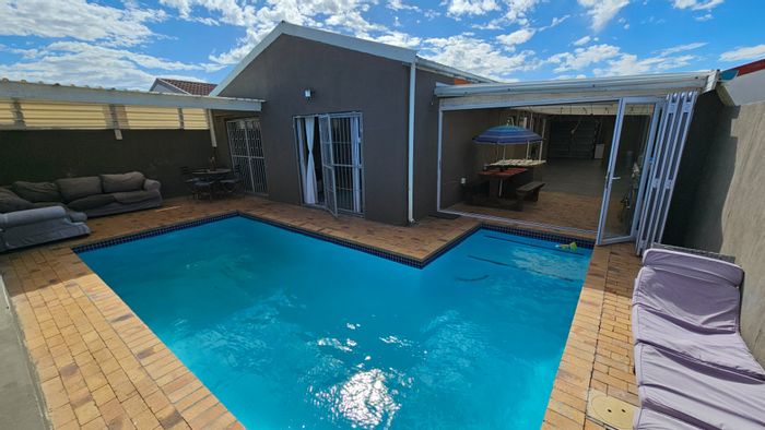 For Sale: Strandfontein Village House with pool, garage, CCTV, and spacious layout.