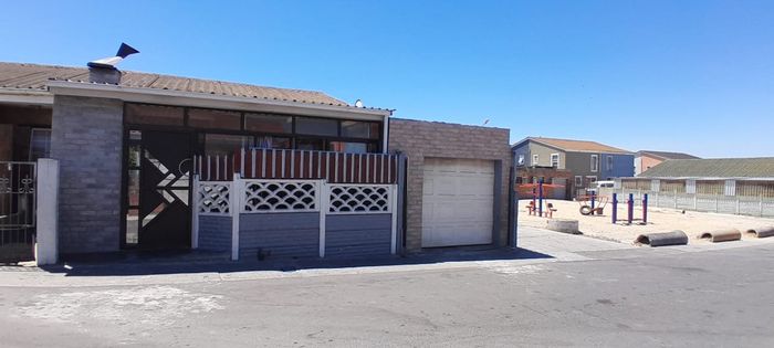 For Sale: Three Bedroom House in Beacon Valley with garage, braai area, and WiFi.