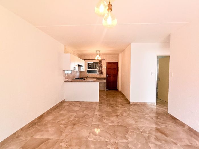 For Sale: Secure 2-Bed Townhouse with Patio, Carport in Buccleuch Complex