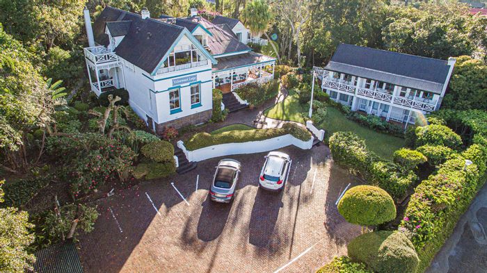 For Sale: House in Westhill with 12 en-suite rooms, pool, and extra land.