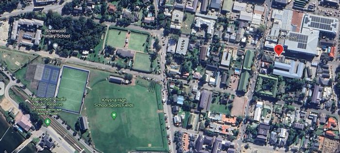 Commercial property for sale in Knysna Central with two retail shops and parking.