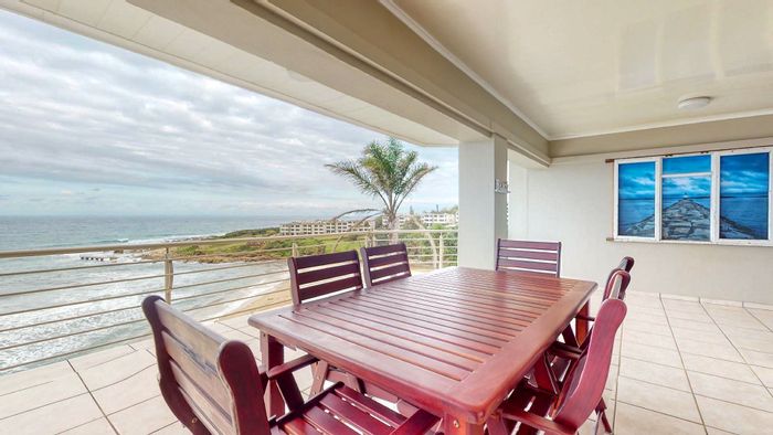 Stunning Uvongo Apartment For Sale: Beach Access, Rooftop Patio, Investment Potential!