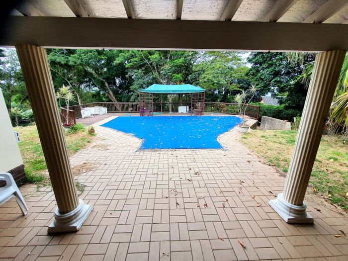 Spacious Umtentweni House for Sale: 6 En-Suite Bedrooms, Cottage, and Pool!