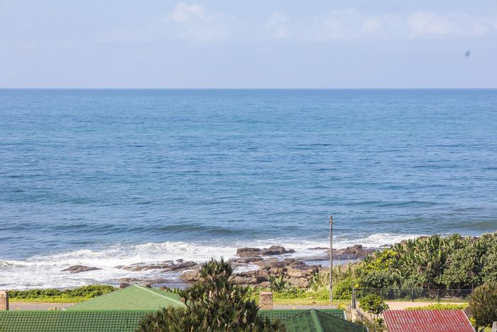 Stunning Uvongo House for Sale: Ocean Views, Entertainment Areas, and Self-Contained Flat!