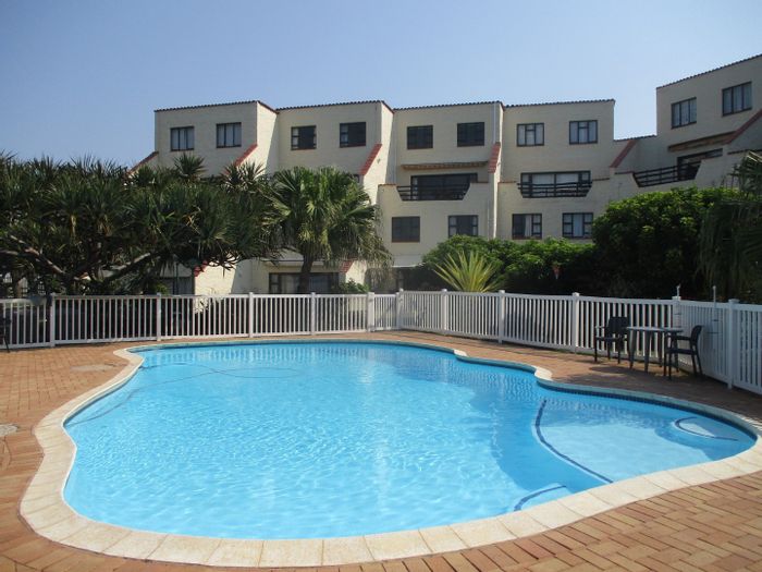 Uvongo Apartment For Sale: Sea views, pool access, beach proximity, secure parking.