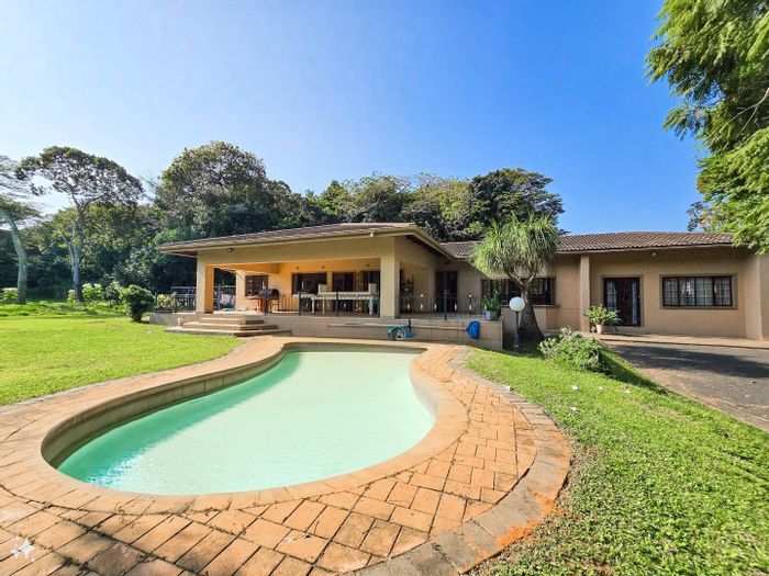 Spacious Umtentweni Home with Pool, Self-Contained Flat, and Ample Storage for Sale!