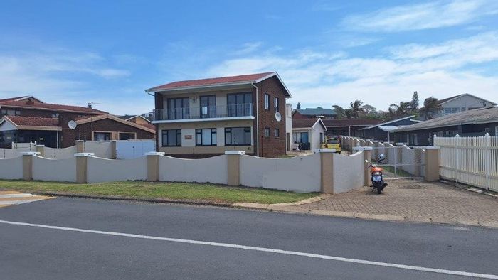 For Sale: Uvongo Beachfront House with Stunning Sea Views and Income Potential!