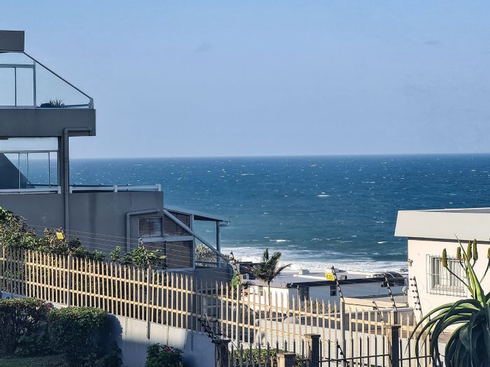 Uvongo Apartment For Sale: Steps from Beach, Shops, and Pool Access!