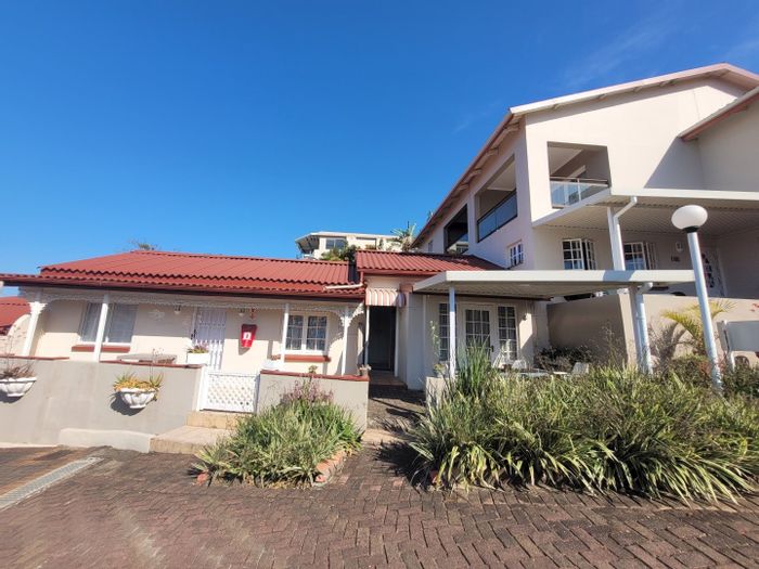 Uvongo Townhouse For Sale: Spacious Living, Pool, Braai, Walk to Beach!