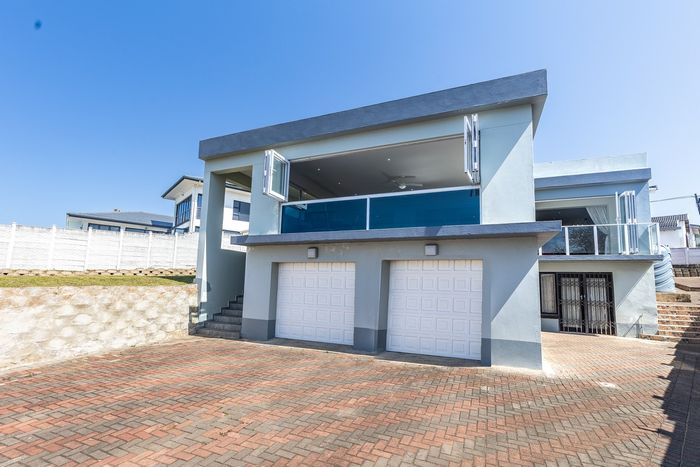 Uvongo Beach Home For Sale: Spacious Living, Stunning Views, Self-Contained Flat!