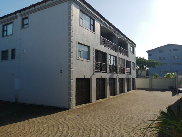 Beachfront Apartment in Hibberdene Central: En-suite, Balcony, Investment Opportunity!