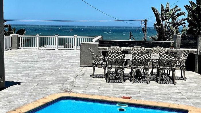 Uvongo House For Sale: 5 beds, pool, sea views, fully furnished, great investment.