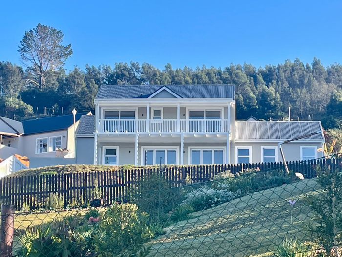 For Sale: House in Green Pastures with solar power, jacuzzi, and double garage.