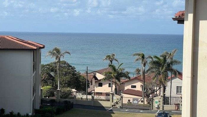 For Sale: Uvongo Apartment with sea views, pools, braai facilities, and carport.