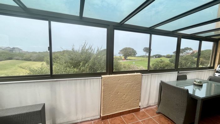 For Sale: Townhouse in Mossel Bay Golf Estate with sea views, garage, and amenities.