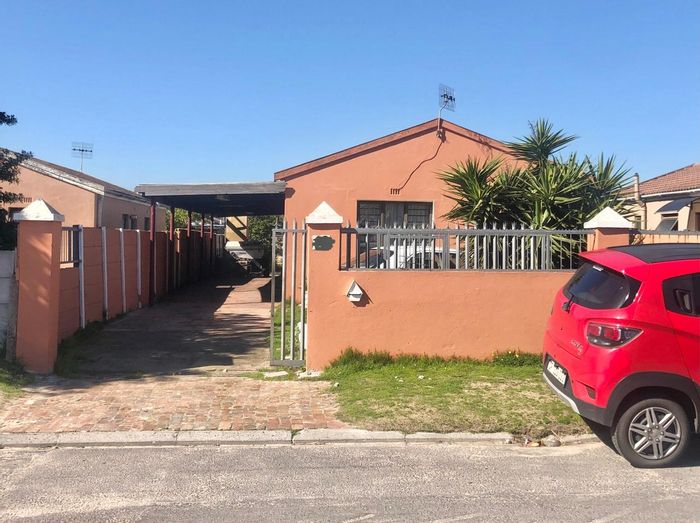 Spacious 4-bedroom house in Scottsdene with entertainment area and secure parking. For Sale.