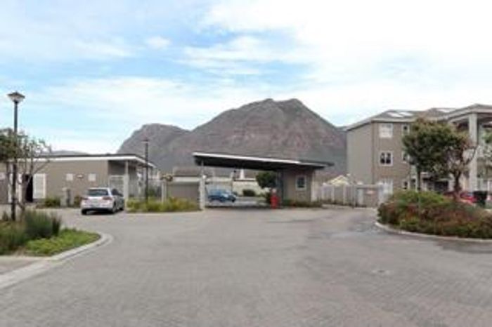 For Sale: Apartment in Muizenberg Central with pool, play park, and beach access.