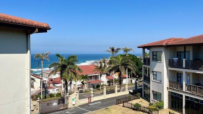 Uvongo Apartment For Sale: 2-bed, en-suite, pool access, sea views, furnished.