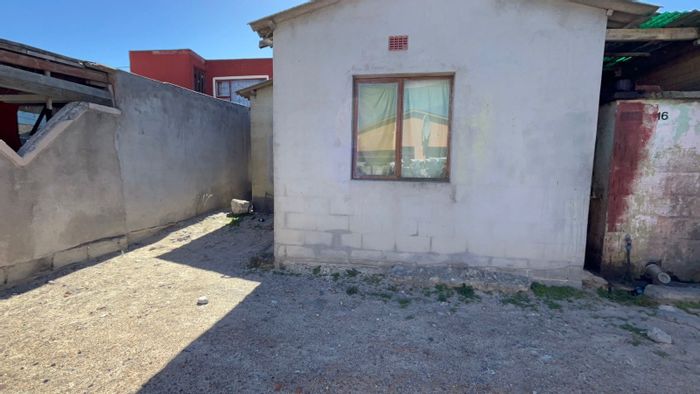 House for Sale in Nonqubela: 2 bedrooms, close to amenities, investment potential.