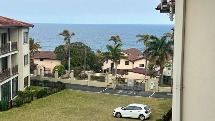 For Sale: Uvongo Apartment with sea views, pool, braai area, and carport.