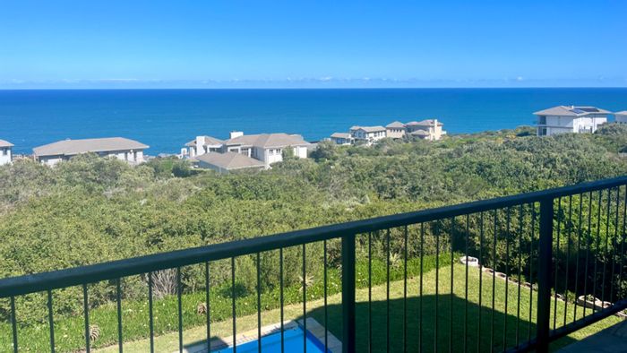 For Sale: House in Pinnacle Point Golf Estate with pool, sea views, and golf cart garage.