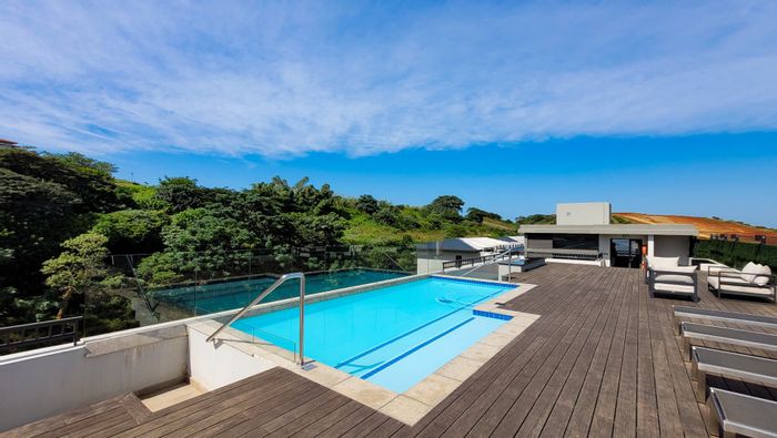 Zimbali Lakes Resort Apartment For Sale: Cozy studio with convenient amenities and serene surroundings.