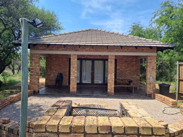 For Sale: Farm in Dinokeng Game Reserve with lodge, camping spots, and riverfront.