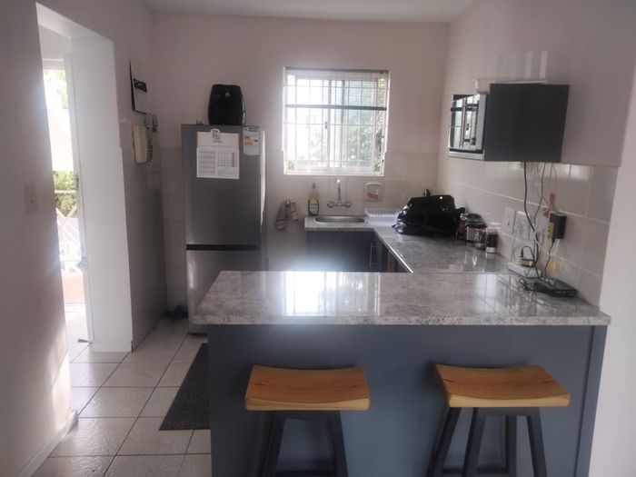 La Colline Apartment To Rent: 2 bedrooms, balcony, secure parking, uncapped WiFi.