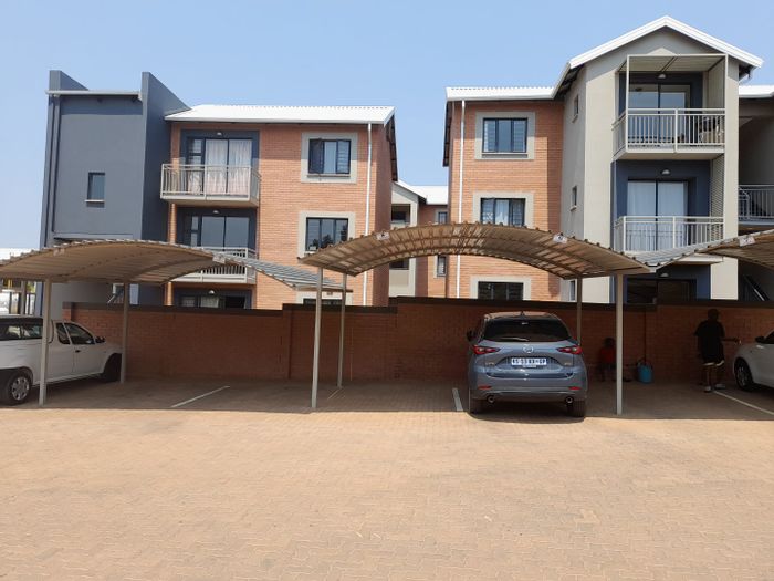 For Sale: Eco Estate Apartment in Roodepark with security, amenities, and nature views.