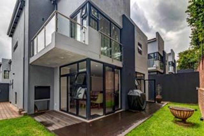 For Sale: Bryanston Townhouse with 4 en-suite bedrooms, garden, and 24-hour security.