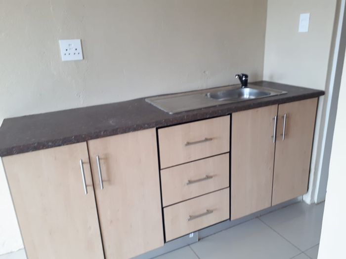 1-Bedroom Apartment To Rent in Mankweng with open plan kitchen and prepaid meter.