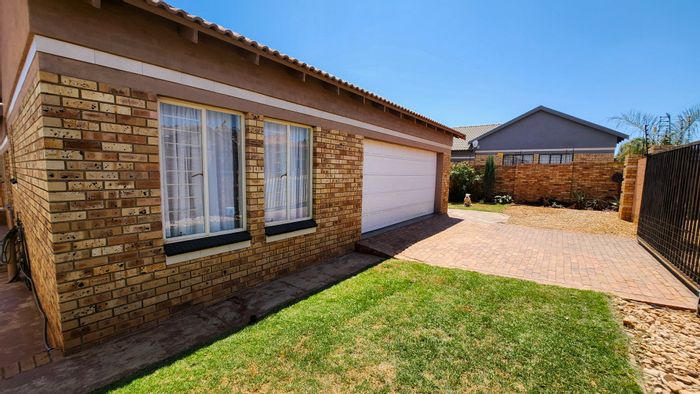 House for Sale in Wilkoppies: 3 beds, 2 baths, double garage, secure yard.