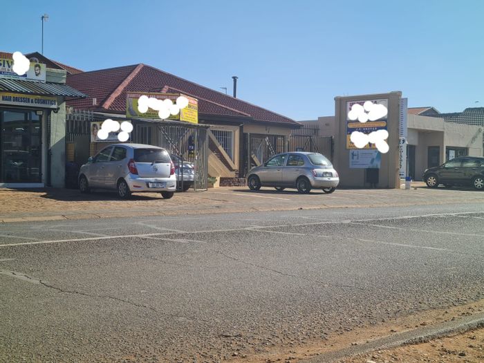 Commercial property for sale in Lenasia Ext 1 with rental income potential.