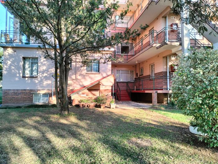 For Sale: Apartment in Pelham with garages, veranda, and income potential.